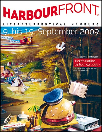 Ernst Kahls Festivalplakat: Ein kugelrunder Hamburger vor einem Buch voll unbeschriebener Blätter.